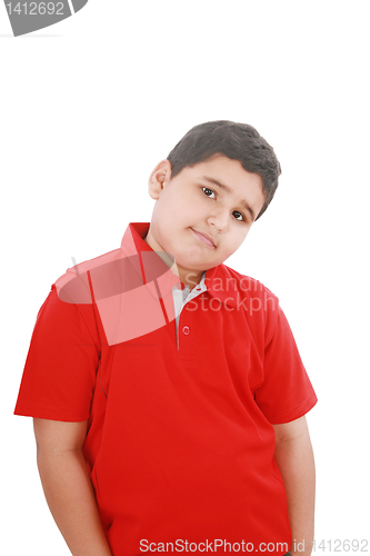 Image of Portrait of a happy little young boy standing with hands in pock