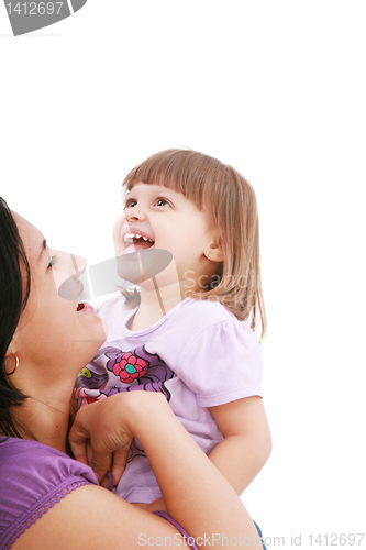 Image of Mother and daughter smiling isolated over a white background. Fo
