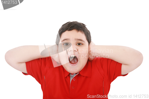 Image of Horizontal portrait of a young boy yelling 