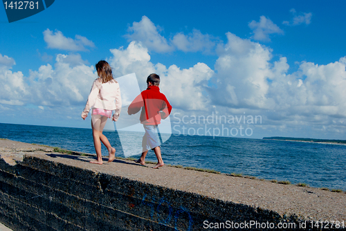 Image of Boy and girl near the sea 