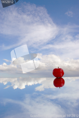 Image of Red apple in the sky 