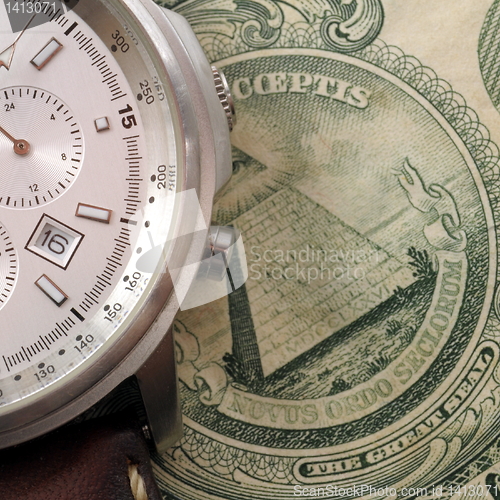 Image of money and watch