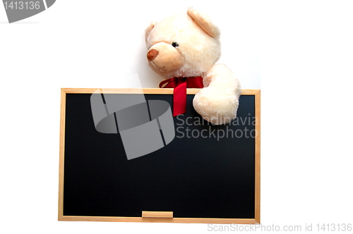 Image of teddy with empty blackboard