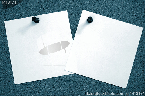 Image of empty sheet paper with push pin