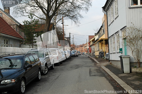 Image of Quiet street with parked cars