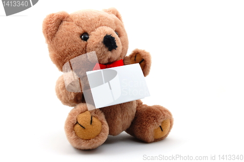Image of isolated teddy with blank sheet