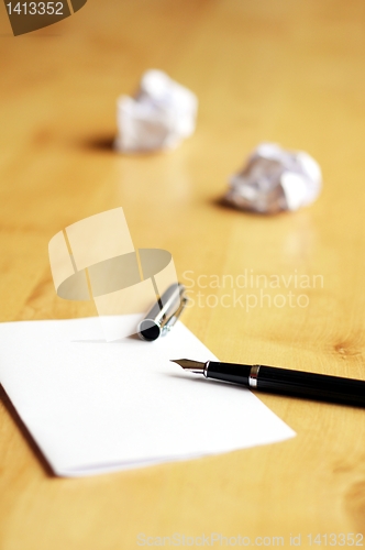 Image of pen and paper