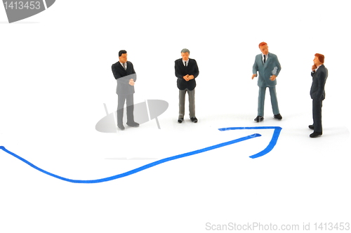 Image of business people on chart background