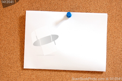 Image of empty sheet paper with push pin