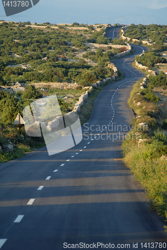 Image of Asphalt winding road, Island of Pag, Croatia.