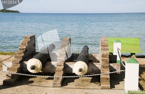 Image of historic antique cannons waterfront harbor Brig Bay Corn Island