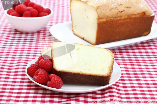 Image of Fresh raspberries and pound cake.