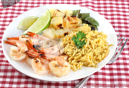 Image of Barbecued Shrimp, rice curry, pineapple, peppers and lime.