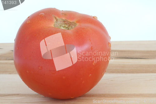 Image of cutting a tomato