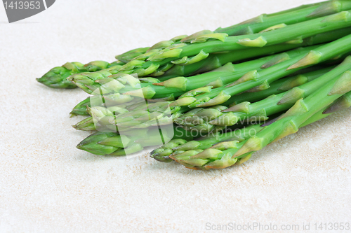 Image of Asparagus on counter, close up with copy space.