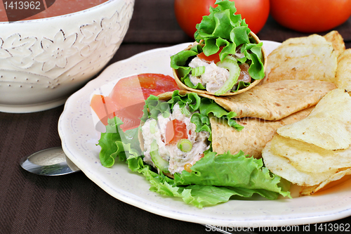 Image of Tuna salad wraps, chips and tomato soup.