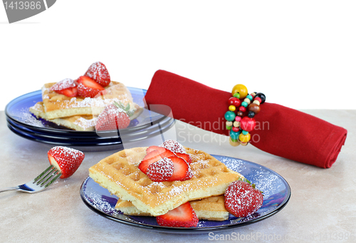 Image of Fresh homemade waffles with strawberries