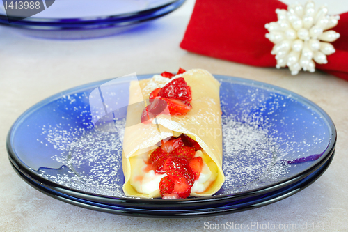 Image of Strawberry crepes or pancakes with selective focus.