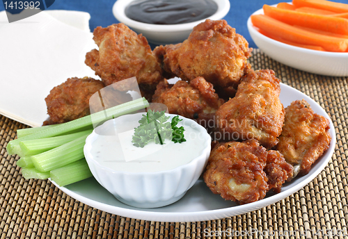 Image of Fresh Chicken Wings with Vegetables and Sauce