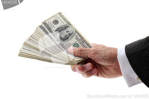 Image of hand holding dollars
