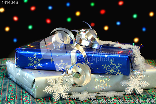 Image of Christmas Gifts in front of Bokeh Lights