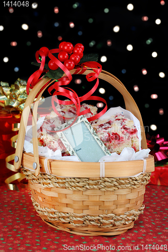 Image of Christmas basket of cranberry bar cookies in front of colorful b