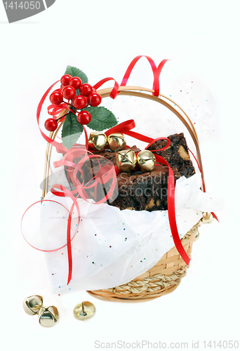 Image of Fudge and peanut butter chip brownies in a gift basket on white 