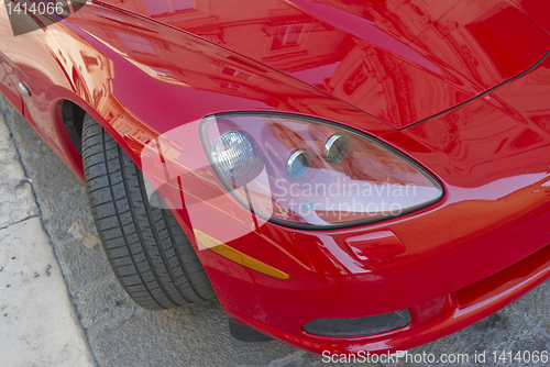 Image of Detail of red car