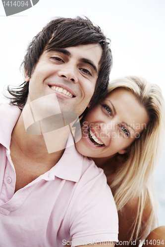 Image of couple smiling at camera
