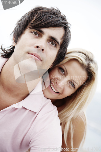 Image of couple smiling at camera