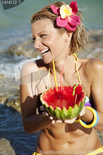 Image of woman with watermelon cocktail