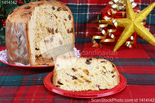 Image of Italian Panettone Cake in Christmas setting.