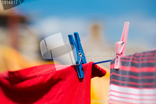 Image of Washed clothes drying outside