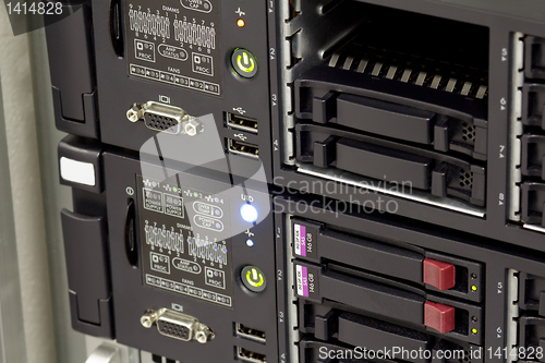 Image of servers stack with hard drives in a datacenter