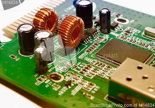 Image of Closeup of a green electronic circuit board