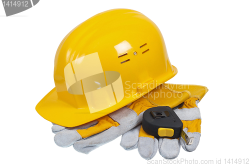 Image of Tools and helmet of the builder, it is isolated on white