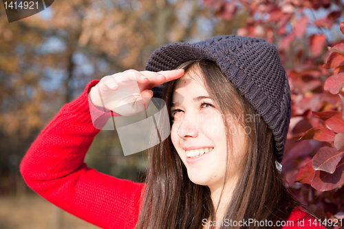 Image of Girl looking against the sun