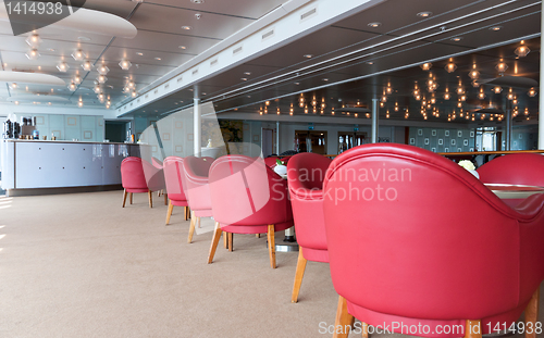 Image of leather chairs and wooden tables