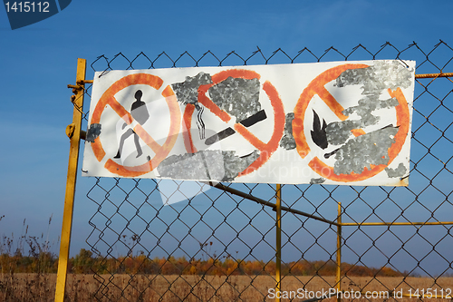 Image of Table with prohibitive signs