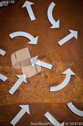 Image of Rusty turn arrow signs