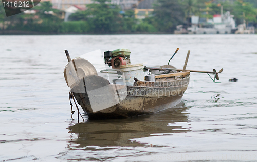 Image of Old wooden boat on Saigon River