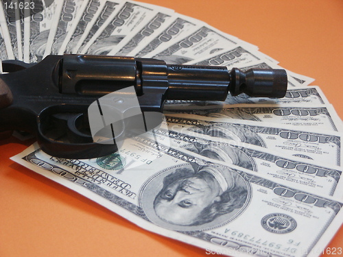 Image of Money and a revolver