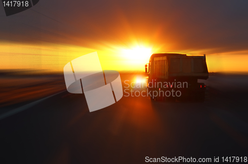Image of cars at sunset highway