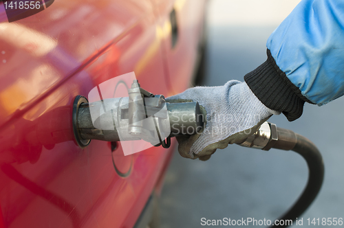 Image of Loading a car with gas