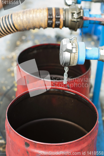 Image of Truck Hoses for fuel station, pumps and oil barrels