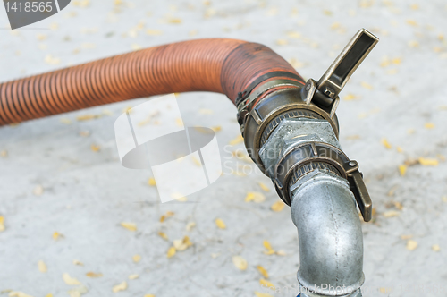 Image of Truck Hoses for fuel station, pumps and oil barrels