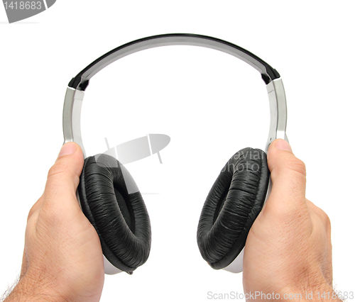 Image of hands and headphones