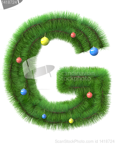 Image of G letter made of christmas tree branches