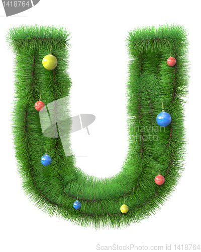 Image of U letter made of christmas tree branches