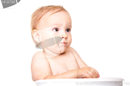 Image of Happy small boy having bath